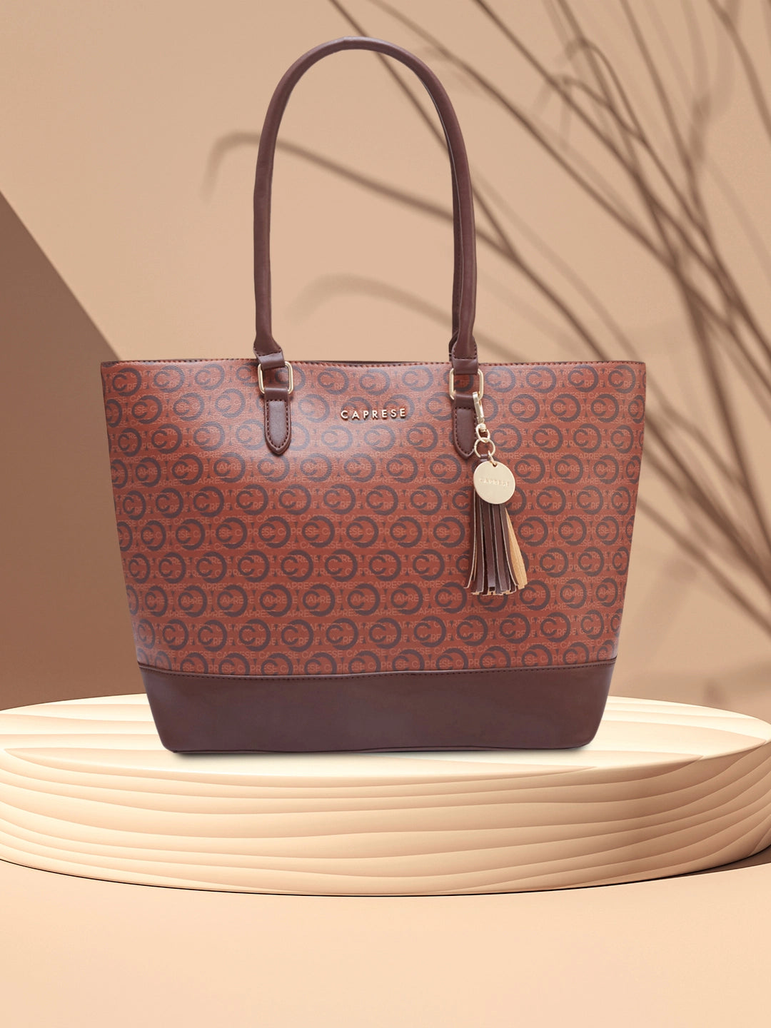 Laptop bag with a padded handle for comfortable carryingLaptop bag with a padded handle for comfortable carryingCaprese Cleo Laptop Tote Large Brown Laptop bag with a padded handle for comfortable carryingLaptop bag with a padded handle for comfortable carryingCaprese Cleo Laptop Tote Large Brown