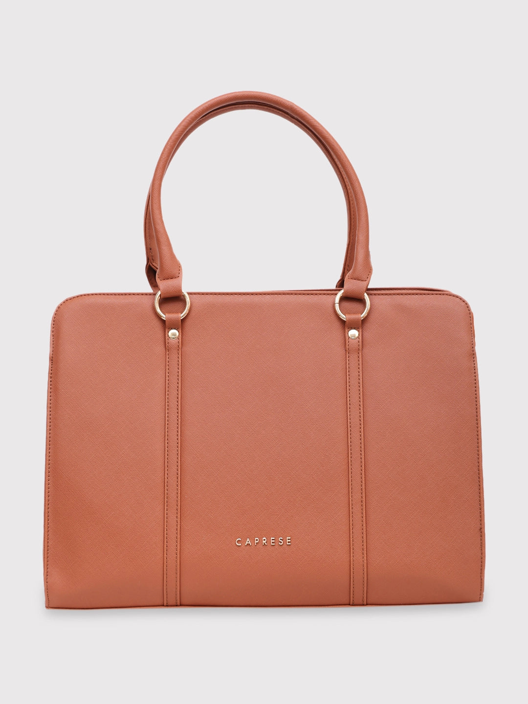 Lightweight nylon laptop bag with a 17-inch padded sleeve for daily commutersLightweight nylon laptop bag with a 17-inch padded sleeve for daily commutersCaprese Sienna Laptop Bag Large Tan Lightweight nylon laptop bag with a 17-inch padded sleeve for daily commutersLightweight nylon laptop bag with a 17-inch padded sleeve for daily commutersCaprese Sienna Laptop Bag Large Tan