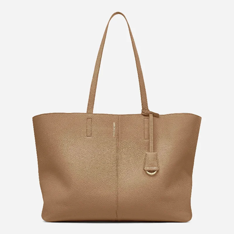 Lightweight nylon laptop bag with a 17-inch padded sleeve for daily commutersLightweight nylon laptop bag with a 17-inch padded sleeve for daily commutersThe Snap Soft Tote - Sandstone Lily Lightweight nylon laptop bag with a 17-inch padded sleeve for daily commutersLightweight nylon laptop bag with a 17-inch padded sleeve for daily commutersThe Snap Soft Tote - Sandstone Lily