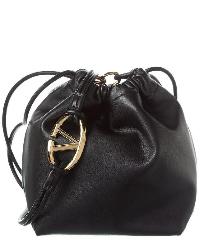 PVC Bucket Bag in Clear with Glitter Accents for a Fun and Edgy Style Valentino Sac VLogo Pouf Bag PVC Bucket Bag in Clear with Glitter Accents for a Fun and Edgy Style Valentino Sac VLogo Pouf Bag