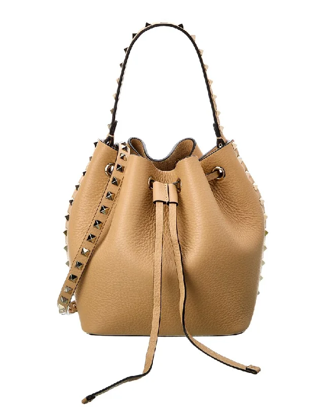 Suede Bucket Bag in Burgundy with Tassel Trim for a Boho - Chic Vibe Valentino Rockstud Grainy Leather Bucket Bag Suede Bucket Bag in Burgundy with Tassel Trim for a Boho - Chic Vibe Valentino Rockstud Grainy Leather Bucket Bag