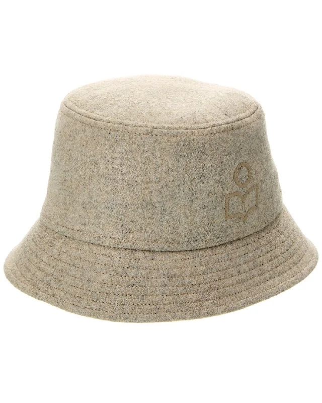 Rattan Bucket Bag in Natural Color with Beadwork for a Tropical Vacation Isabel Marant Logo Wool Bucket Hat Rattan Bucket Bag in Natural Color with Beadwork for a Tropical Vacation Isabel Marant Logo Wool Bucket Hat