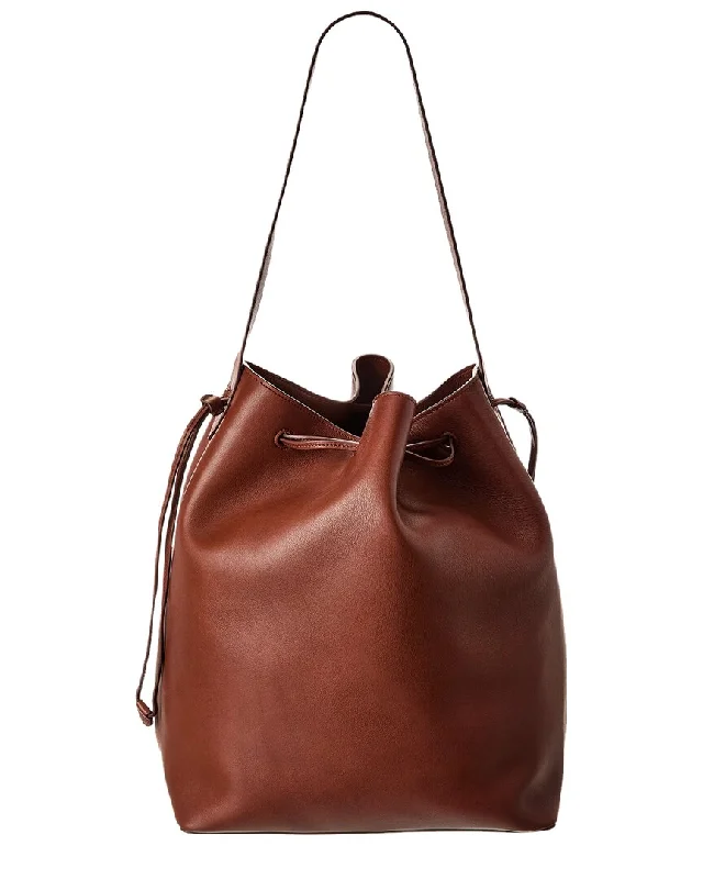 Bucket Bag with Embossed Animal Print in Tan for a Wild and Stylish Statement The Row Belvedere Leather Bucket Bag Bucket Bag with Embossed Animal Print in Tan for a Wild and Stylish Statement The Row Belvedere Leather Bucket Bag