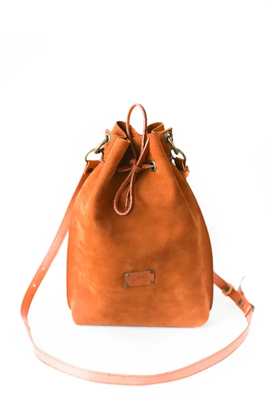 Canvas and Leather - Trimmed Bucket Bag in Beige for a Casual Weekend Getaway Brown Leather Bucket Bag Canvas and Leather - Trimmed Bucket Bag in Beige for a Casual Weekend Getaway Brown Leather Bucket Bag