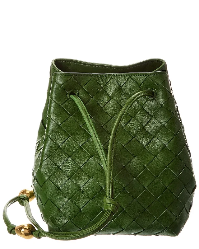 Suede Bucket Bag in Burgundy with Tassel Trim for a Boho - Chic Vibe Bottega Veneta Intrecciato Leather Bucket Bag Suede Bucket Bag in Burgundy with Tassel Trim for a Boho - Chic Vibe Bottega Veneta Intrecciato Leather Bucket Bag