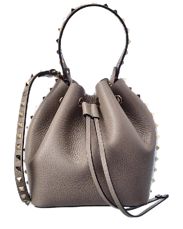 Suede Bucket Bag in Burgundy with Tassel Trim for a Boho - Chic Vibe Valentino Rockstud Grainy Leather Bucket Bag Suede Bucket Bag in Burgundy with Tassel Trim for a Boho - Chic Vibe Valentino Rockstud Grainy Leather Bucket Bag