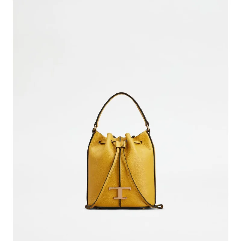 PVC Bucket Bag in Clear with Glitter Accents for a Fun and Edgy Style T Timeless Bucket Bag in Leather Micro PVC Bucket Bag in Clear with Glitter Accents for a Fun and Edgy Style T Timeless Bucket Bag in Leather Micro