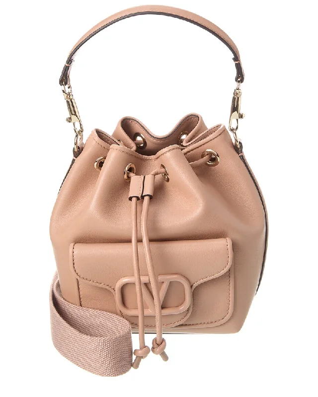 Linen Bucket Bag in Natural Beige with Braided Strap for a Rustic Summer Ensemble Valentino VLogo Loco Leather Bucket Bag Linen Bucket Bag in Natural Beige with Braided Strap for a Rustic Summer Ensemble Valentino VLogo Loco Leather Bucket Bag