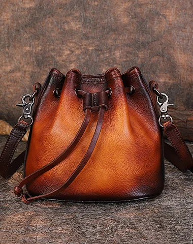 Denim Bucket Bag in Washed Blue with Patchwork for a Vintage - Inspired Look Vintage Tan Leather Womens Bucket Shoulder Bags Bucket Crossbody Purse for Women Denim Bucket Bag in Washed Blue with Patchwork for a Vintage - Inspired Look Vintage Tan Leather Womens Bucket Shoulder Bags Bucket Crossbody Purse for Women
