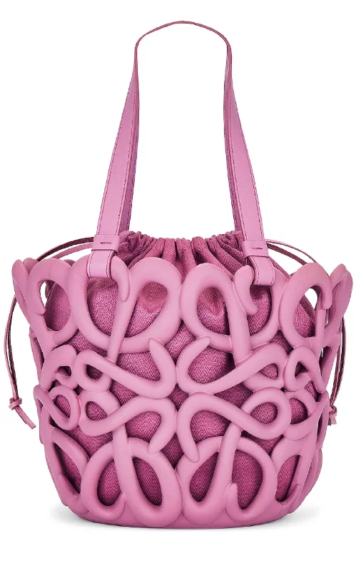Rattan Bucket Bag in Natural Color with Beadwork for a Tropical Vacation Anagram Inflated Basket Bag in Purple Rattan Bucket Bag in Natural Color with Beadwork for a Tropical Vacation Anagram Inflated Basket Bag in Purple