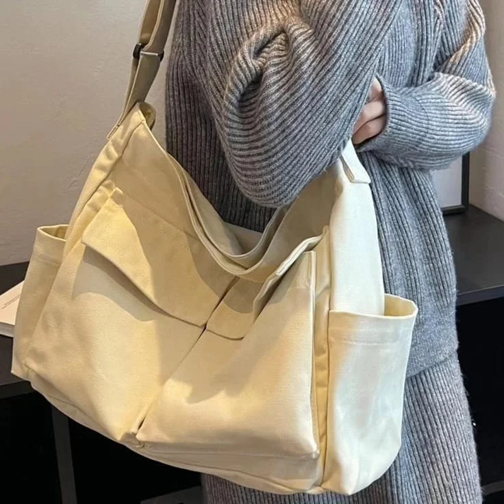 Waterproof Canvas Messenger Bag for Commuting in All Weather Off White Cargo Bag