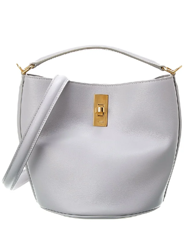 Canvas and Leather - Trimmed Bucket Bag in Beige for a Casual Weekend Getaway CELINE Teen 16 Leather Bucket Bag Canvas and Leather - Trimmed Bucket Bag in Beige for a Casual Weekend Getaway CELINE Teen 16 Leather Bucket Bag