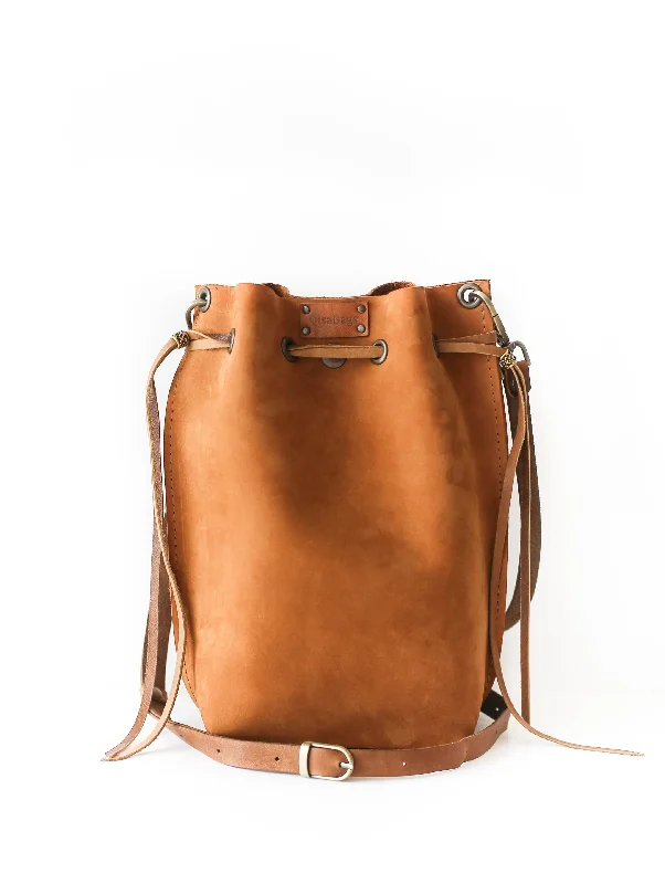 Suede Bucket Bag in Burgundy with Tassel Trim for a Boho - Chic Vibe Brown Nubuck Bucket Bag w/Drawstrings