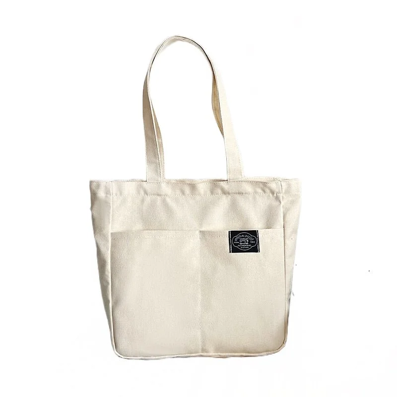 Foldable Canvas Shopping Bag for Easy Storage in Your Car Effortless Elegance: Women's Solid Color Canvas Tote Bag Foldable Canvas Shopping Bag for Easy Storage in Your Car Effortless Elegance: Women's Solid Color Canvas Tote Bag