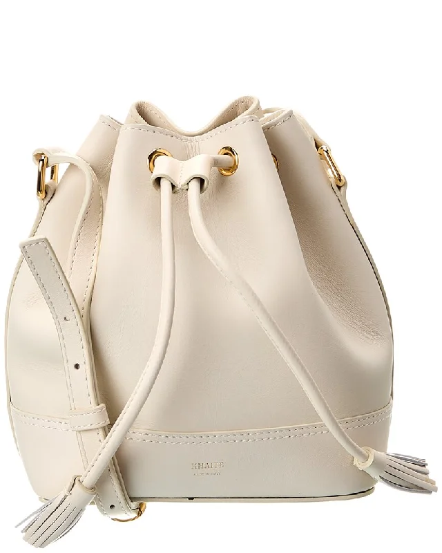 PVC Bucket Bag in Clear with Glitter Accents for a Fun and Edgy Style KHAITE Leather Bucket Bag PVC Bucket Bag in Clear with Glitter Accents for a Fun and Edgy Style KHAITE Leather Bucket Bag