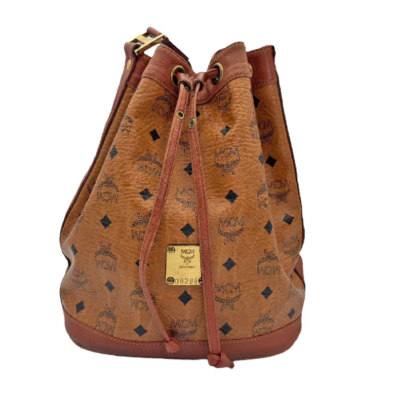 Women's Genuine Leather Bucket Bag in Chestnut Brown with Gold - Tone Hardware for a Sophisticated Look MCM Dessau Drawstring Bag in Visetos - Cognac Women's Genuine Leather Bucket Bag in Chestnut Brown with Gold - Tone Hardware for a Sophisticated Look MCM Dessau Drawstring Bag in Visetos - Cognac