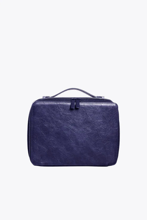 Lightweight nylon duffel travel bag with multiple exterior pockets for quick accessThe Cosmetic Case in Navy Lightweight nylon duffel travel bag with multiple exterior pockets for quick accessThe Cosmetic Case in Navy
