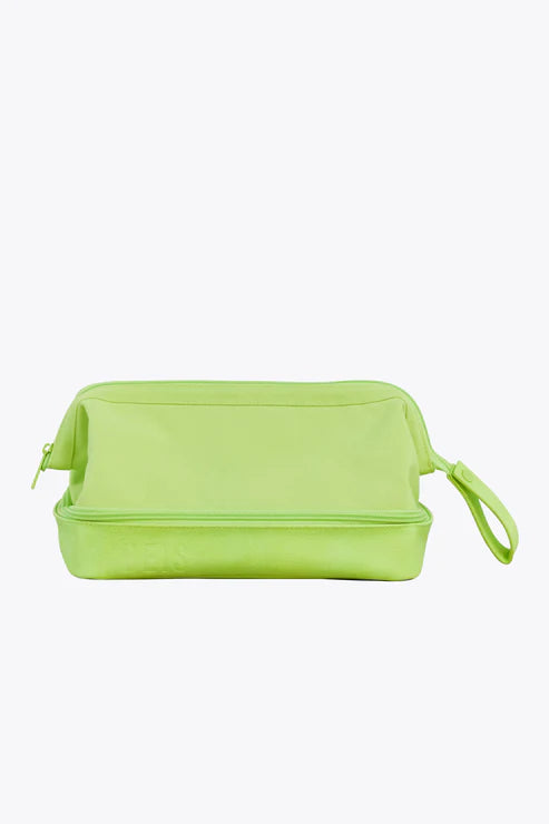 Foldable fabric travel bag for convenient storage when not in useThe Dopp Kit in Citron