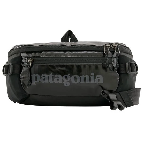 Rolling travel bag with adjustable telescopic handle for different user heightsBlack Hole Waist Pack 5L Rolling travel bag with adjustable telescopic handle for different user heightsBlack Hole Waist Pack 5L