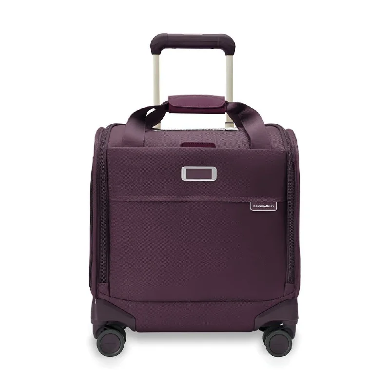 Lightweight nylon duffel travel bag with multiple exterior pockets for quick accessBriggs & Riley Baseline Limited Edition Cabin Spinner - Plum Lightweight nylon duffel travel bag with multiple exterior pockets for quick accessBriggs & Riley Baseline Limited Edition Cabin Spinner - Plum