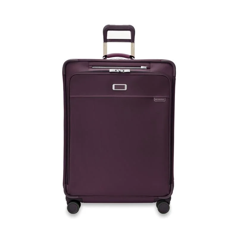 Designer - branded leather travel bag for luxury business travelersBriggs & Riley Baseline Limited Edition Large Expandable Spinner - Plum Designer - branded leather travel bag for luxury business travelersBriggs & Riley Baseline Limited Edition Large Expandable Spinner - Plum