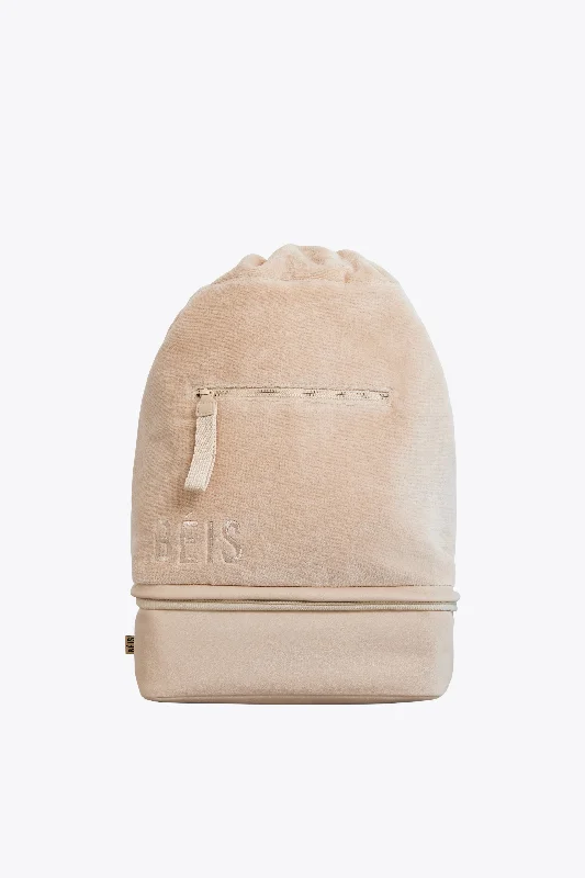 Soft - sided travel bag with reinforced corners for durabilityThe Terry Backpack Cooler in Beige Soft - sided travel bag with reinforced corners for durabilityThe Terry Backpack Cooler in Beige
