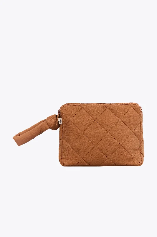 Smart travel bag with integrated GPS tracker for lost item recoveryThe Clutch in Wild Child Smart travel bag with integrated GPS tracker for lost item recoveryThe Clutch in Wild Child