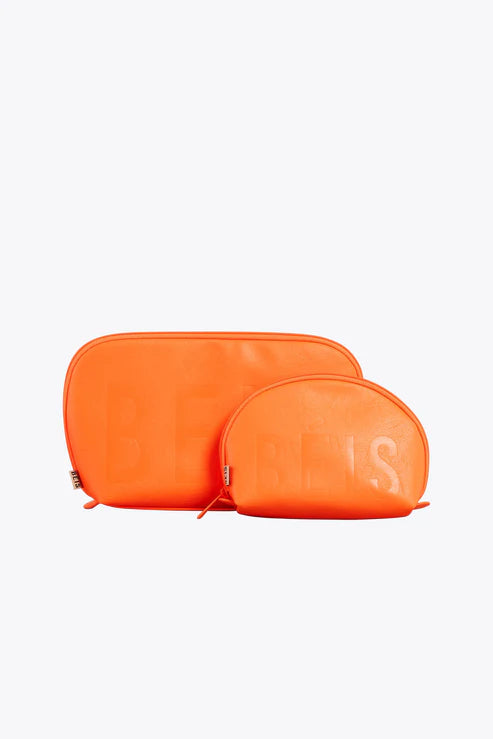 Expandable hard - shell polycarbonate travel bag for long - term international tripsThe Cosmetic Pouch Set in Creamsicle Expandable hard - shell polycarbonate travel bag for long - term international tripsThe Cosmetic Pouch Set in Creamsicle