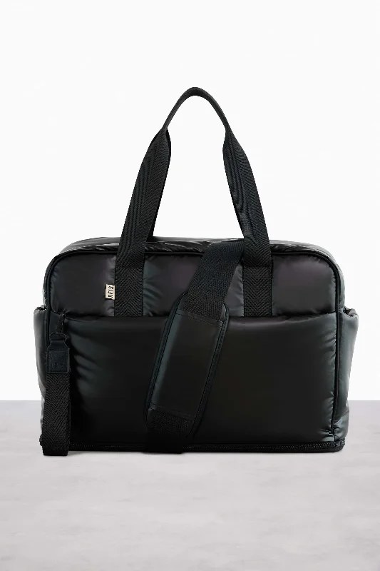 Stackable travel bag set with various sizes for diverse packing needsThe Expandable Duffle in Black Stackable travel bag set with various sizes for diverse packing needsThe Expandable Duffle in Black