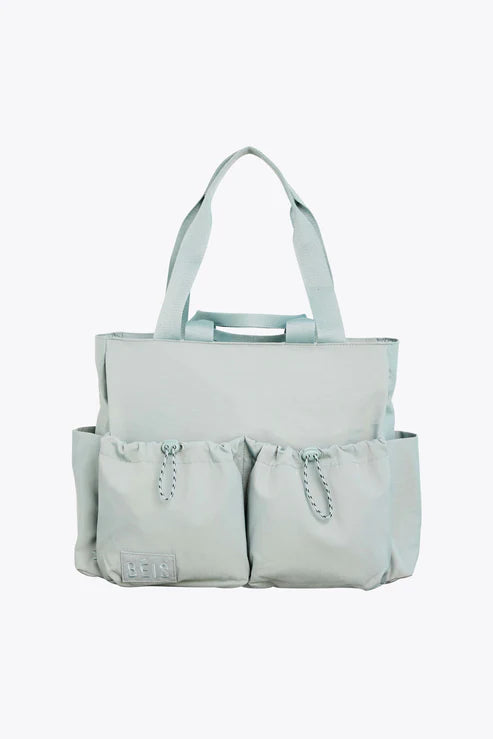 Compact carry - on travel bag with spinner wheels for easy maneuvering in airportsThe Sport Carryall in Slate Compact carry - on travel bag with spinner wheels for easy maneuvering in airportsThe Sport Carryall in Slate