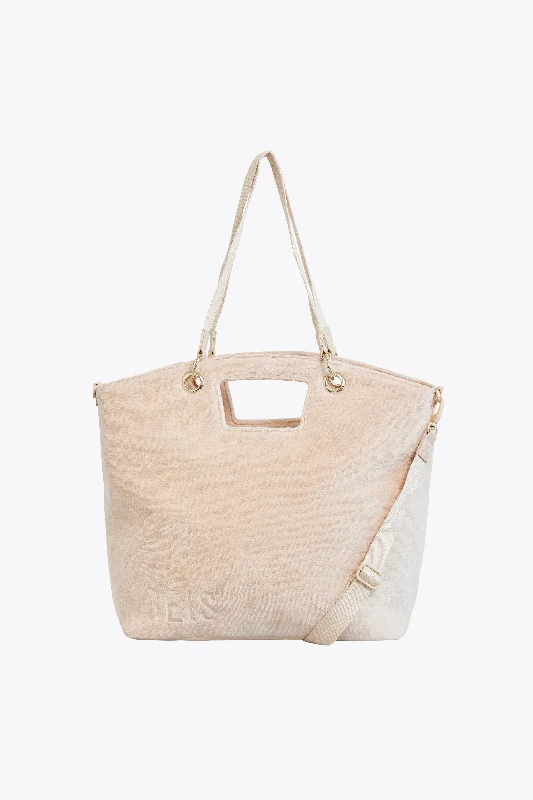 Designer - branded leather travel bag for luxury business travelersThe Terry Tote in Beige Designer - branded leather travel bag for luxury business travelersThe Terry Tote in Beige