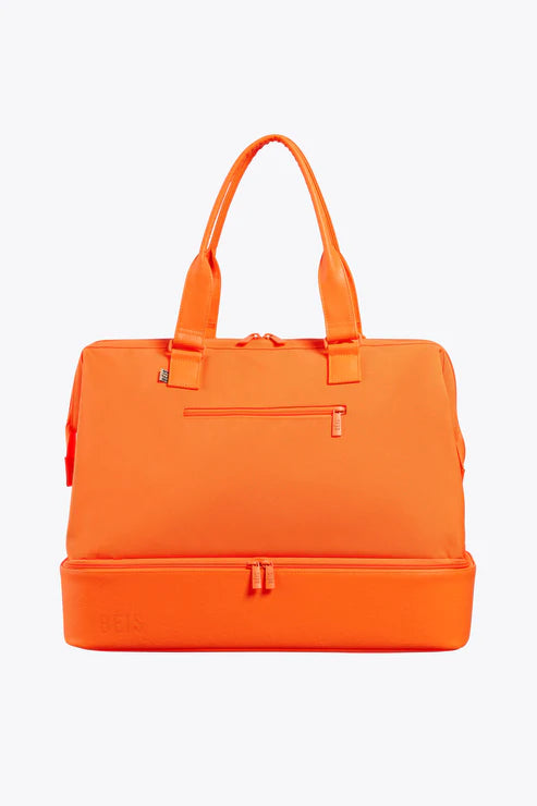 Garment - protected travel bag with hanging system for suits and dressesThe Weekender in Creamsicle Garment - protected travel bag with hanging system for suits and dressesThe Weekender in Creamsicle