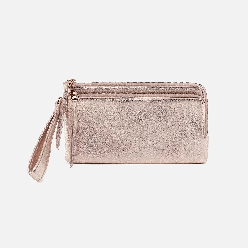 Money clips with magnetic closureMoney clips with magnetic closureDayton Wristlet In Metallic Leather - Pink Gold Metallic Money clips with magnetic closureMoney clips with magnetic closureDayton Wristlet In Metallic Leather - Pink Gold Metallic