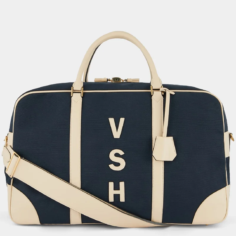 Rolling travel bag with adjustable telescopic handle for different user heightsRolling travel bag with adjustable telescopic handle for different user heightsBespoke Walton Latimer Weekend Bag Rolling travel bag with adjustable telescopic handle for different user heightsRolling travel bag with adjustable telescopic handle for different user heightsBespoke Walton Latimer Weekend Bag