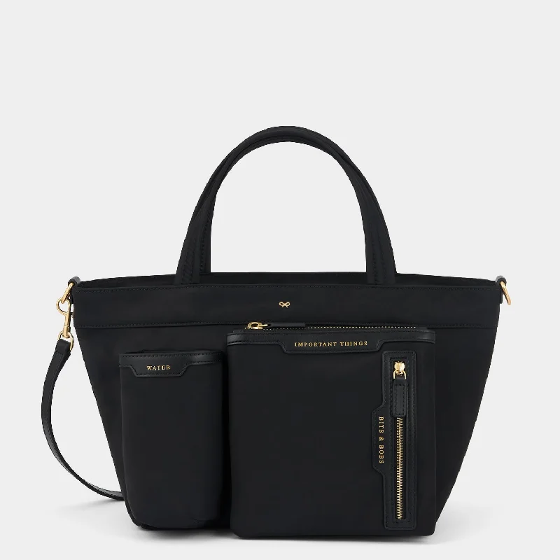 Travel bag with a detachable toiletry pouch for convenienceTravel bag with a detachable toiletry pouch for convenienceE/W Multi Pocket Mini Cross-body Tote Travel bag with a detachable toiletry pouch for convenienceTravel bag with a detachable toiletry pouch for convenienceE/W Multi Pocket Mini Cross-body Tote