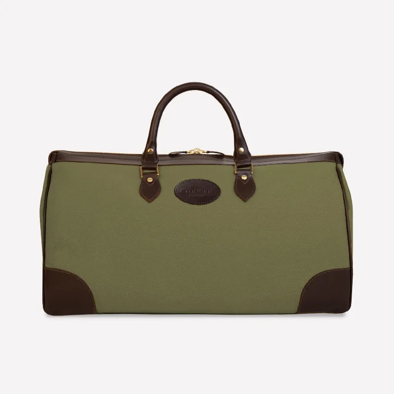 Lightweight nylon duffel travel bag with multiple exterior pockets for quick accessLightweight nylon duffel travel bag with multiple exterior pockets for quick accessNew Hurlingham Overnight Bag - Olive Lightweight nylon duffel travel bag with multiple exterior pockets for quick accessLightweight nylon duffel travel bag with multiple exterior pockets for quick accessNew Hurlingham Overnight Bag - Olive