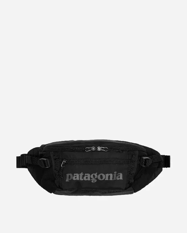 Men's backpack with a reflective strip for night-time visibilityDurable briefcases for heavy-duty useBlack Hole Waist Pack 5L Black Men's backpack with a reflective strip for night-time visibilityDurable briefcases for heavy-duty useBlack Hole Waist Pack 5L Black