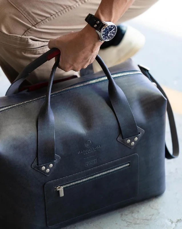 Smart travel bag with integrated GPS tracker for lost item recoverySmart travel bag with integrated GPS tracker for lost item recoveryPilot Bag (IWC x Cafe) Smart travel bag with integrated GPS tracker for lost item recoverySmart travel bag with integrated GPS tracker for lost item recoveryPilot Bag (IWC x Cafe)