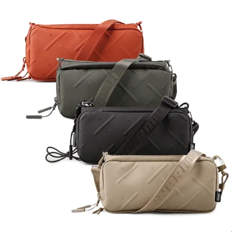 Lightweight nylon duffel travel bag with multiple exterior pockets for quick accessLightweight nylon duffel travel bag with multiple exterior pockets for quick accessSkinarma Juno Sacoche + Scout Lanyard Lightweight nylon duffel travel bag with multiple exterior pockets for quick accessLightweight nylon duffel travel bag with multiple exterior pockets for quick accessSkinarma Juno Sacoche + Scout Lanyard