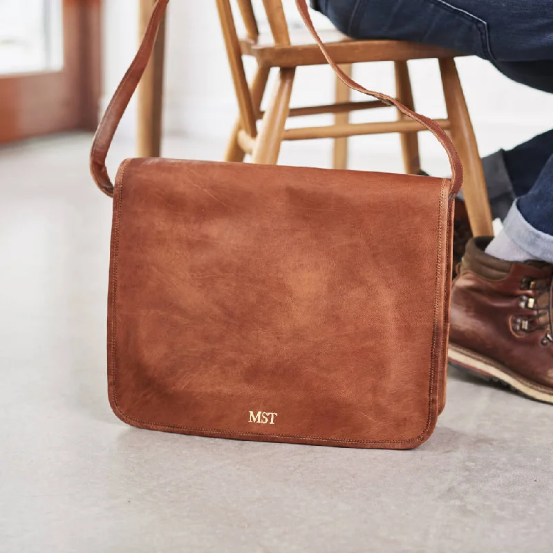 Convertible travel bag that can be used as a backpack or toteConvertible travel bag that can be used as a backpack or toteTan Leather Messenger Bag Convertible travel bag that can be used as a backpack or toteConvertible travel bag that can be used as a backpack or toteTan Leather Messenger Bag