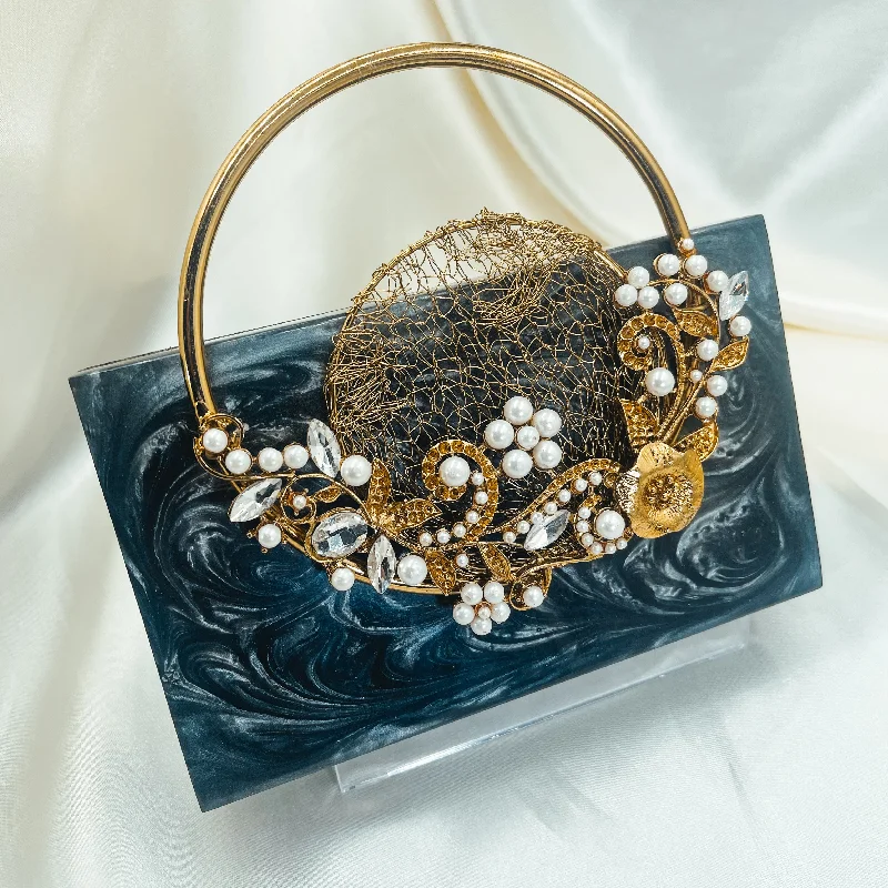 Two - tone clutch with a contrast color lining for added styleANDREA Resin Clutch