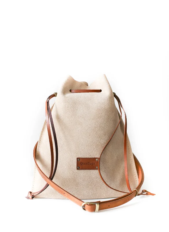 Color - blocked crossbody bag with bold hues for a fashion statementBeige Suede Cross Body Bag Color - blocked crossbody bag with bold hues for a fashion statementBeige Suede Cross Body Bag