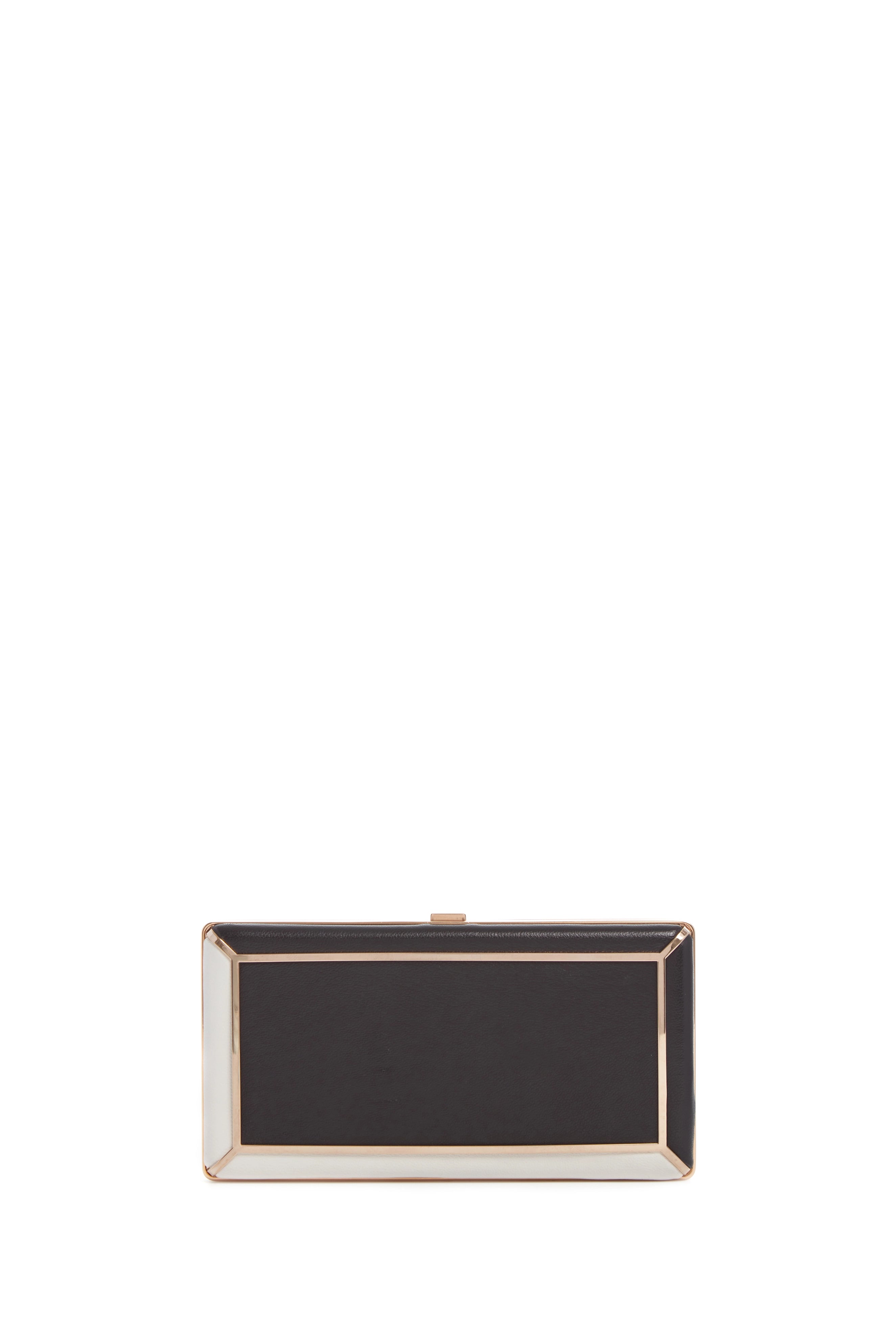 Miniature evening bag with a fold - over clasp for a compact optionCallas Clutch in Black & Ivory Nappa Leather Miniature evening bag with a fold - over clasp for a compact optionCallas Clutch in Black & Ivory Nappa Leather