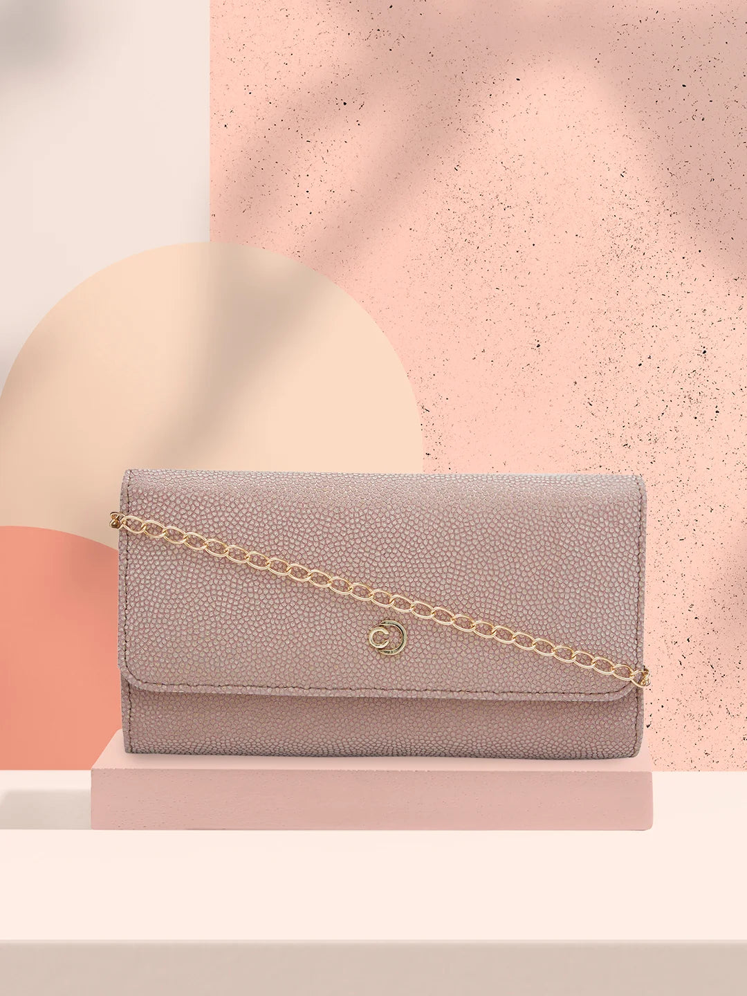 Velvet clutch with a tassel detail for a bohemian - chic styleCaprese Betty Flapover Clutch Large Blush Velvet clutch with a tassel detail for a bohemian - chic styleCaprese Betty Flapover Clutch Large Blush