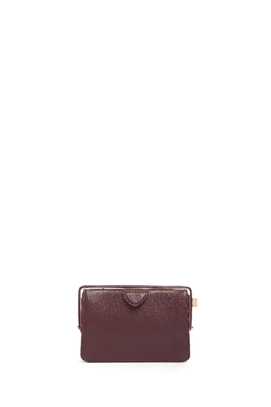 Embroidered silk clutch with a traditional motif for a cultural touchCarrington Clutch in Bordeaux Textured Leather Embroidered silk clutch with a traditional motif for a cultural touchCarrington Clutch in Bordeaux Textured Leather