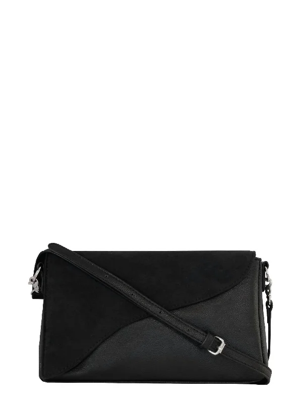 Embroidered silk clutch with a traditional motif for a cultural touchChelsea Clutch In Black Embroidered silk clutch with a traditional motif for a cultural touchChelsea Clutch In Black