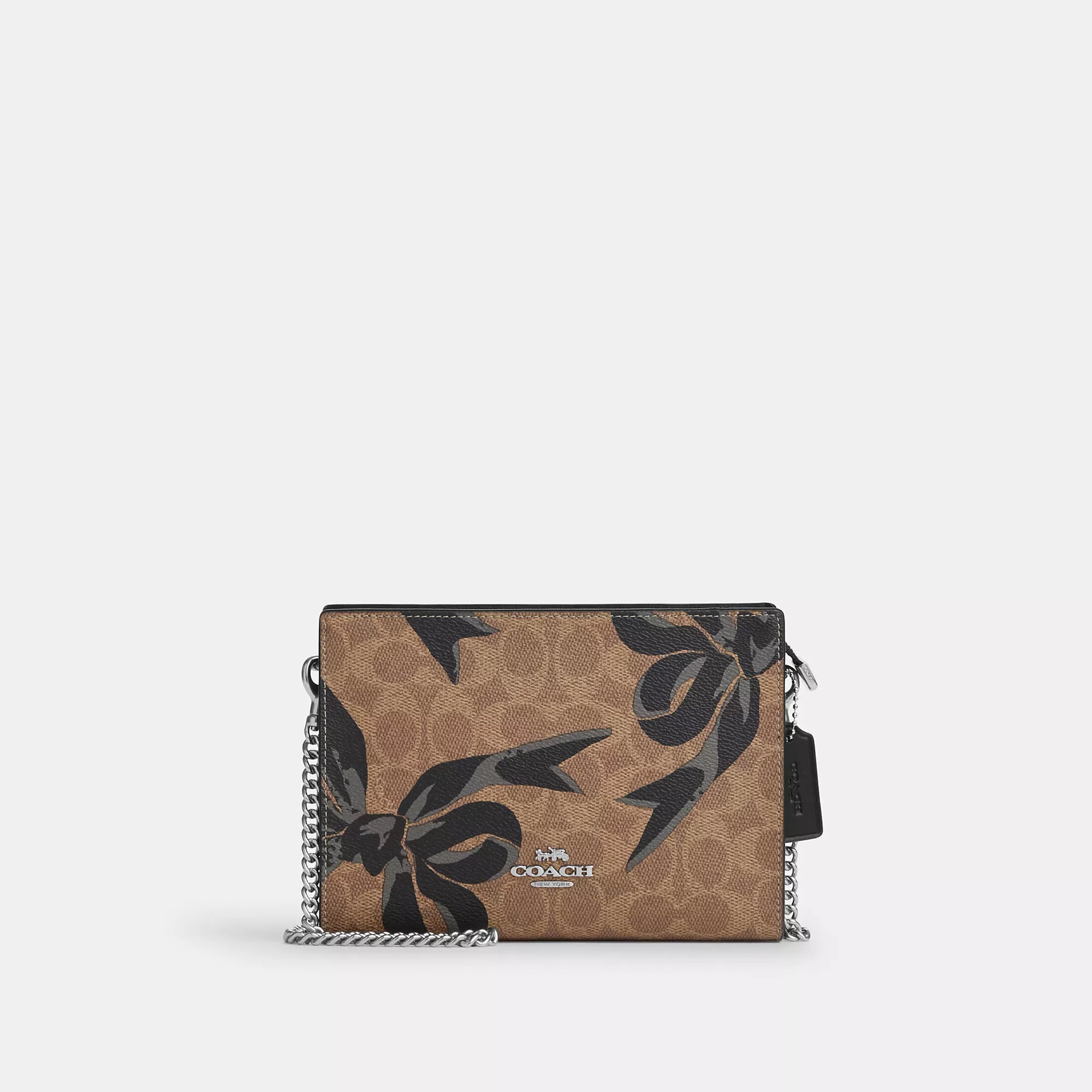 Silk crossbody bag with a delicate print for a feminine touchCoach Outlet Slim Crossbody Bag In Signature Canvas With Bow Print Silk crossbody bag with a delicate print for a feminine touchCoach Outlet Slim Crossbody Bag In Signature Canvas With Bow Print