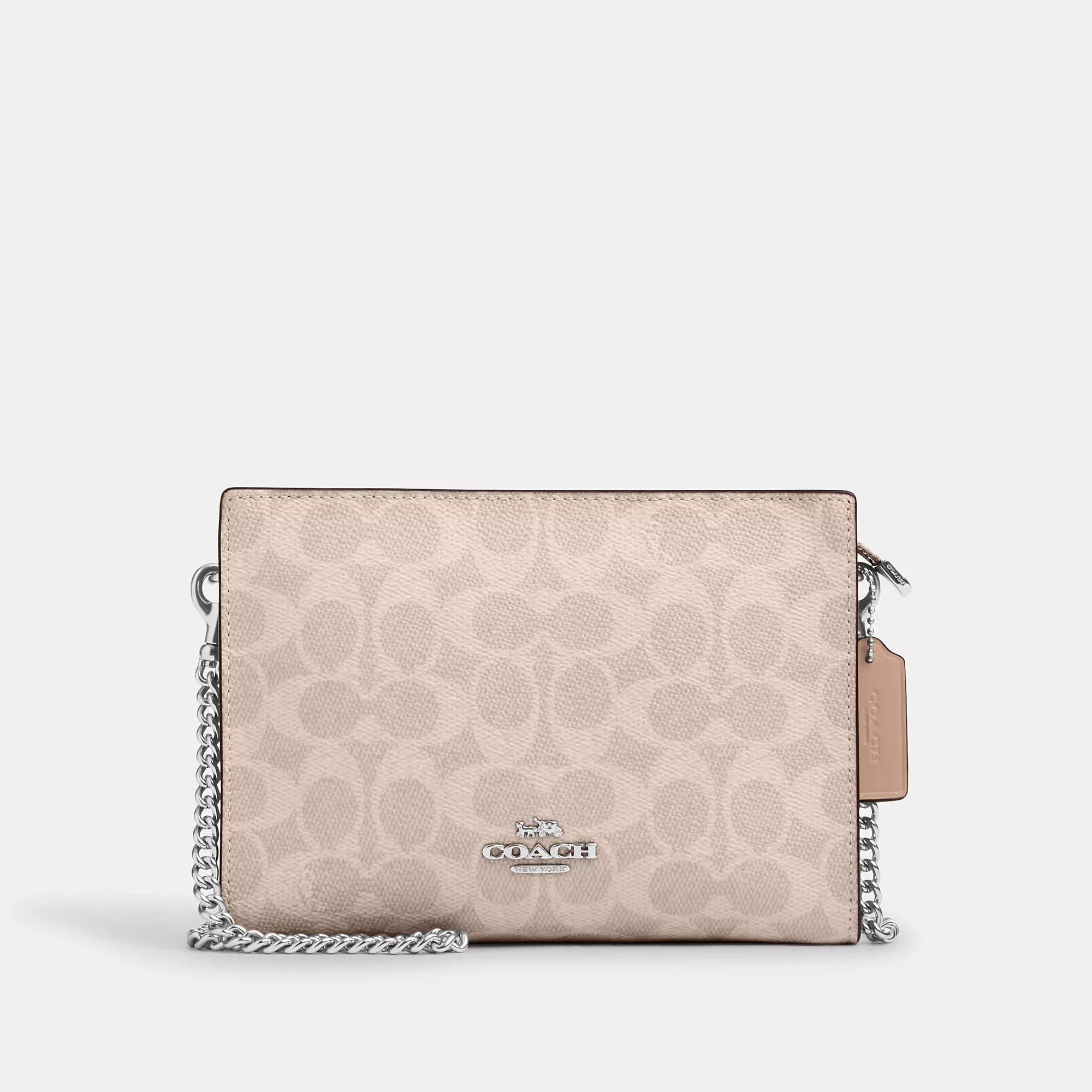 Faux fur crossbody bag with a soft and fluffy texture for winterCoach Outlet Slim Crossbody Bag In Signature Canvas Faux fur crossbody bag with a soft and fluffy texture for winterCoach Outlet Slim Crossbody Bag In Signature Canvas