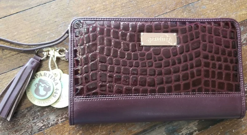 Laser - cut leather evening bag with an intricate patternCroc Clutch In Bordeaux