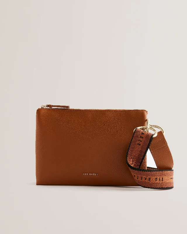 Canvas crossbody bag with a patchwork design for a casual and artsy feelDarceyy Branded Webbing Leather Crossbody Bag Brn-Choc Canvas crossbody bag with a patchwork design for a casual and artsy feelDarceyy Branded Webbing Leather Crossbody Bag Brn-Choc